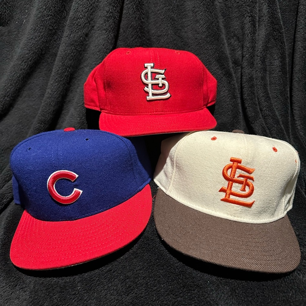 Three vintage major-league professional baseball caps and like new condition